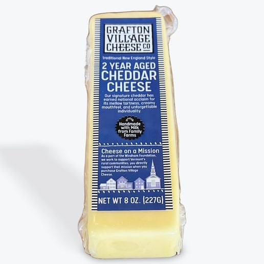 A pack of Grafton 2 year aged Cheddar, available at our Provincetown liquor store, Perry's.