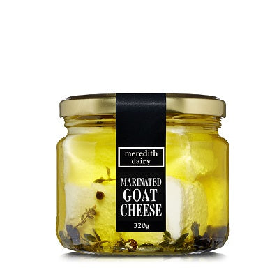A jar of Meredith Dairy marinated goat cheese, available at our Provincetown liquor store, Perry's.