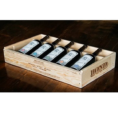 A wooden box containing 5 bottles of Bond Cabernet Sauvignon from each of their vineyards of the 2016 vintage.