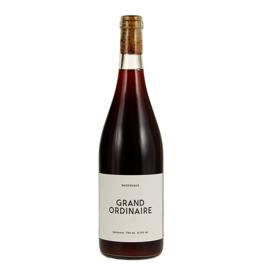 Wine bottle labeled 'Grand Ordinaire' on a white background available at Perry's Provincetown